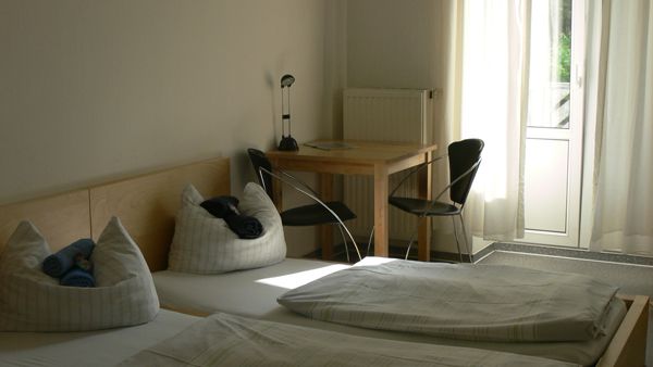 A bed Privatzimmer - Apartment-Ansicht 2